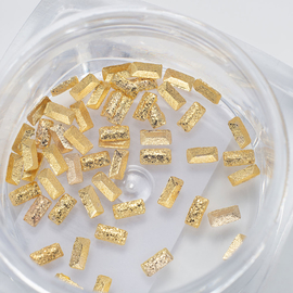Decor for nails Metal Komilfo Rivets, rectangle, 1,5 * 3 mm, gold